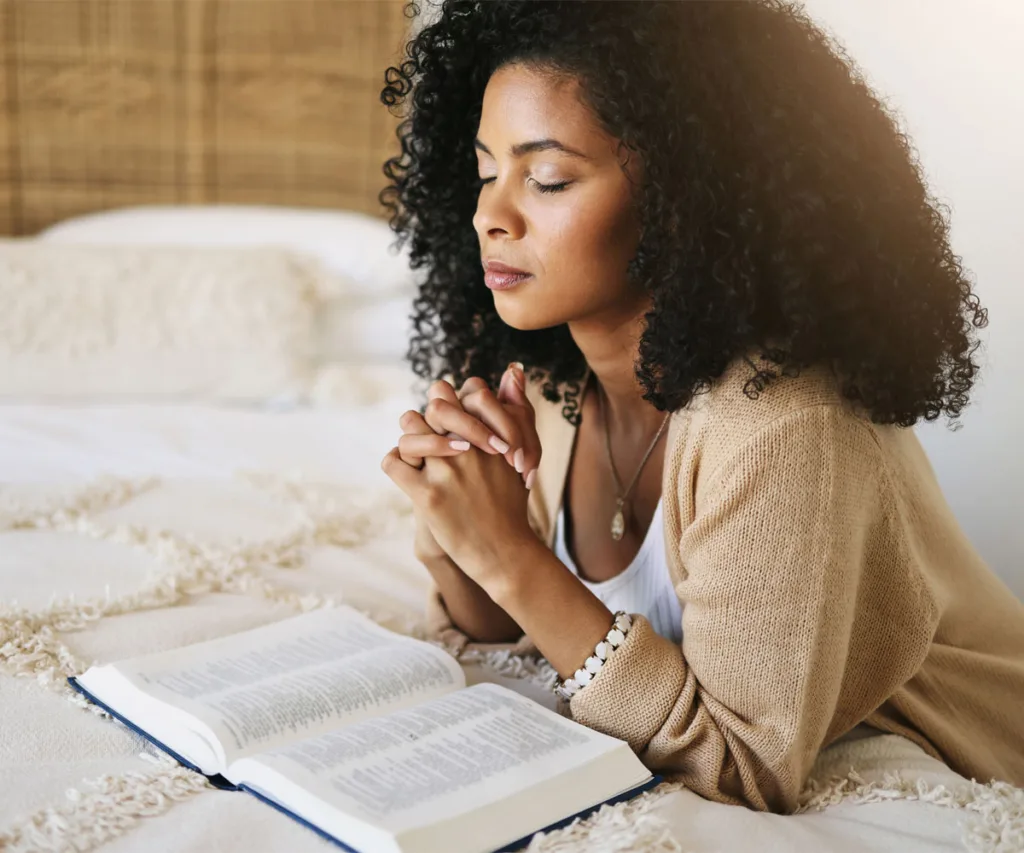 Image of a woman praying